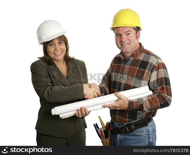 A female engineer and a building contractor shaking hands. Isolated on white.