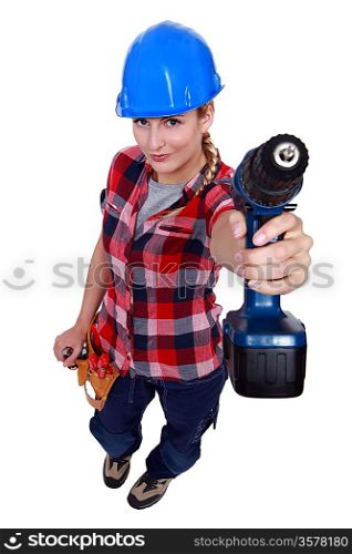 A female handyman with a drill.