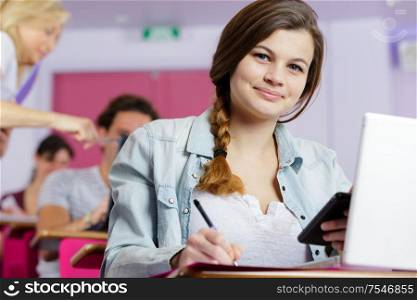 a female university student smiling