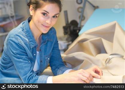 a female upholsterer at work
