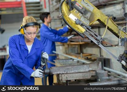 a female worker machine technician
