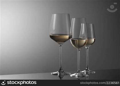 a few glasses of wine on a light background. wine glasses on a light background