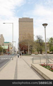 A few of a street of downtown Hamilton in the spring with some high rise buildings.