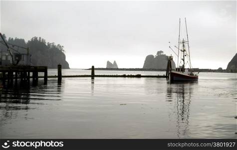A fishing vessel pulls in the fuel up at the Marina in LaPush