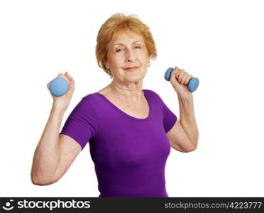 A fit healthy senior woman, proud of herself for keeping in shape. Isolated on white.