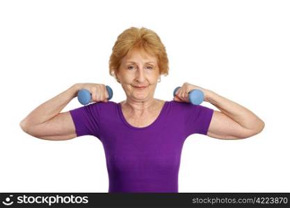 A fit pretty senior worman working out with freeweights. Isolated on white.