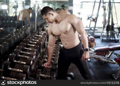 A fitness man work out in the gym