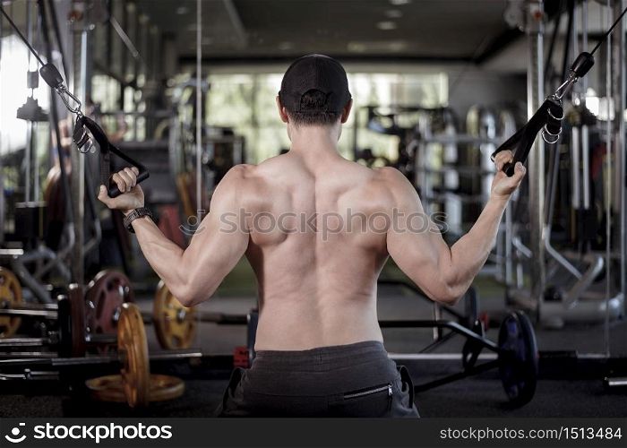 A fitness man work out in the gym