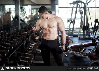 A fitness man work out in the gym