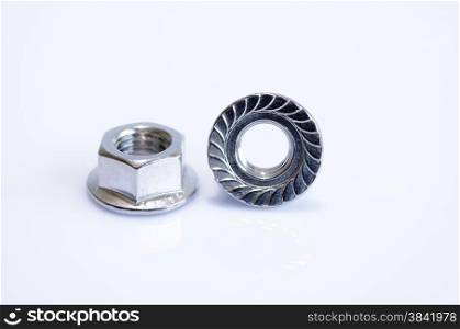 A flange nut is a nut that has a wide flange at one end that acts as an integrated, non-spinning washer.