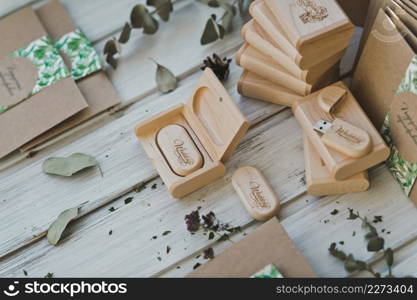 A flash drive for the delivery of wood material.. A wooden flash drive in a box for handing over the material 3712.