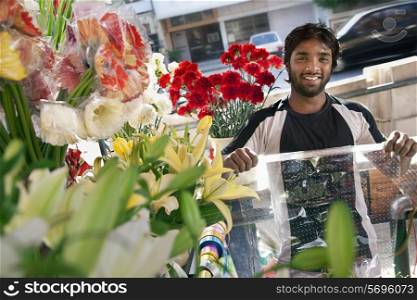 A florist holding wrapping paper
