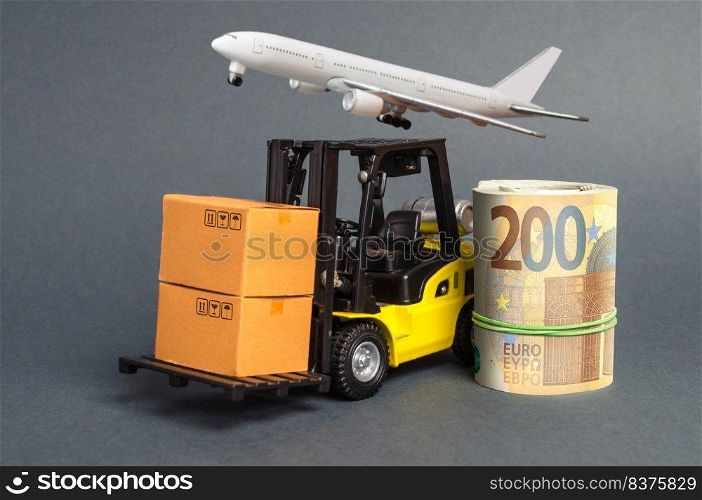 A forklift truck carries cardboard boxes and Euros roll. Transport company. Performance efficient. Trade and production of products and goods, balance import export. development of the global economy