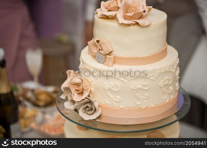 A four-story wedding cake.. A huge cake decorated with fruits and berries for the wedding 2788.