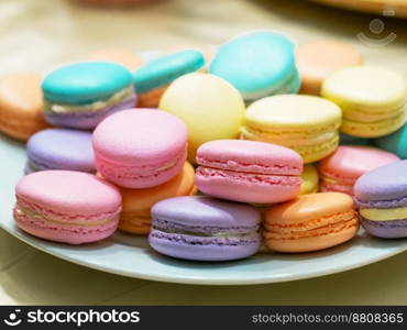 A french sweet delicacy, macaroons variety closeup.macaroon colourful texture.