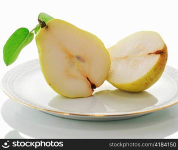 a fresh pear on a plate