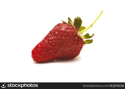 A fresh strawberry isolated on white background closeup