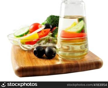 a fresh vegetable salad and cooking oil