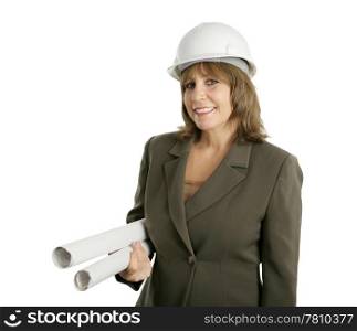 A friendly, smiling female engineer holding rolls of blueprints. Isolated.