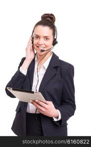 A friendly telephone operator smiling isolated over a white background