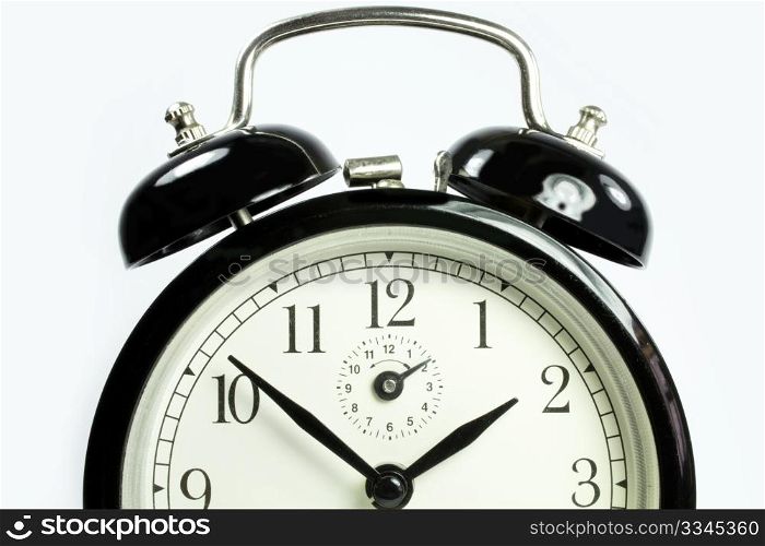a front view of an antique clock on a white background black