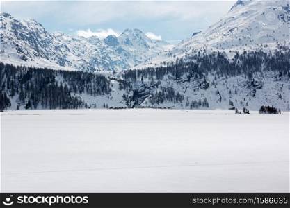 A frozen Lake Sils (Silsersee) in the Engadin Valley, in Switzerland