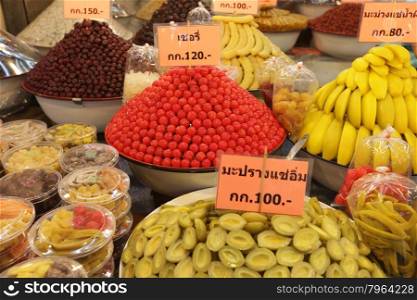 a fruit market in the city of Ayutthaya north of bangkok in Thailand in southeastasia.. ASIA THAILAND AYUTHAYA MARKET FRUITS SWEETS