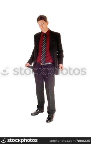 A full body picture of a broken businessman with his pants pocket out,showing he has no money.