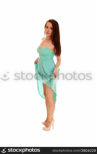 A full length picture of a beautiful young Asian woman in a turquoise longdress, isolated for white background.