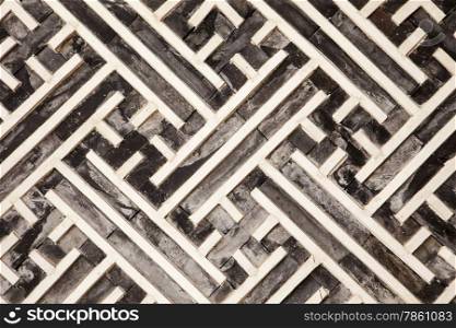A geometric pattern made of wood slats is one of the architectural details in one of the buildings in the Gyeongbokgung Palace complex in Seoul.