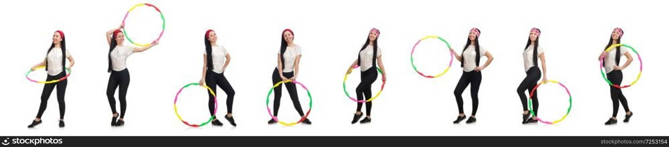 A girl in sport suit with hula hoop isolated on white