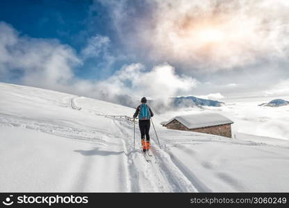 A girl makes ski mountaineering