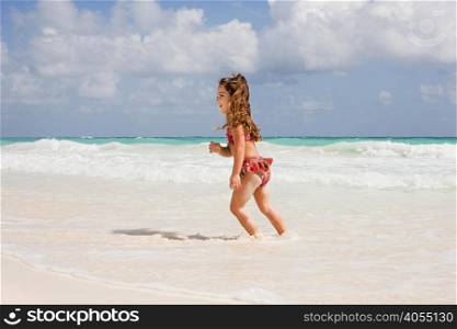 A girl running in the sea