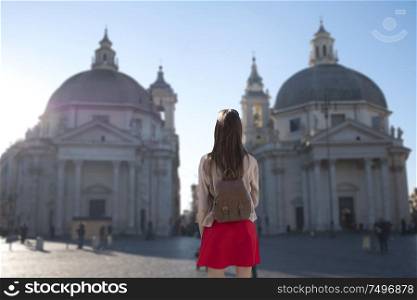 A girl walks through the streets of Rome