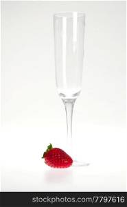 a glass and juicy strawberries