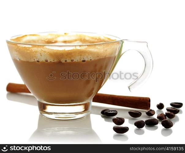 a glass cup of coffee with cream