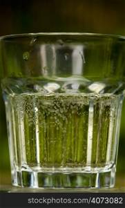 A glass of clear liquid