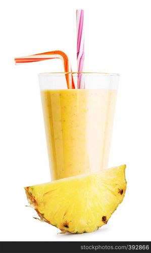 A glass of pineapple smoothie or yogurt with pineapple slice isolated on a white background. A glass of pineapple smoothie or yogurt with pineapple slice