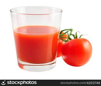 a glass of tomatoe juice with fresh tomatoes