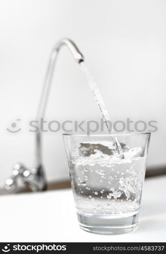 A glass of water from filter tap