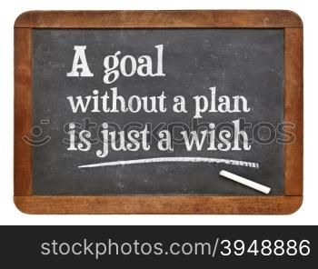 A goal without plan is just a wish - advice or reminder - white chalk text on a vintage slate blackboard