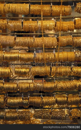 a Gold shop the souq or Market in the old town in the city of Dubai in the Arab Emirates in the Gulf of Arabia.. ARABIA EMIRATES DUBAI