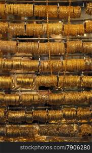 a Gold shop the souq or Market in the old town in the city of Dubai in the Arab Emirates in the Gulf of Arabia.. ARABIA EMIRATES DUBAI