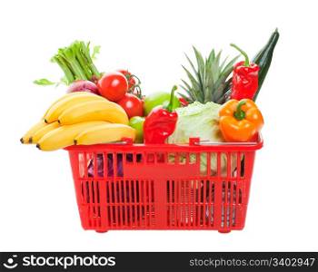A grocery basket filled with fresh fruits, vegetables, and canned goods. Shot on white background.