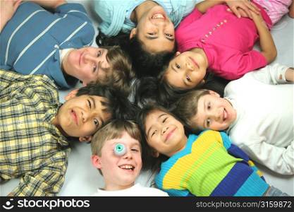 A group of children laying down