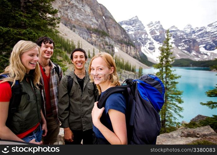 A group of friends on a hiking / camping trip in the mountains