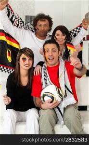 A group of friends supporting the German football team