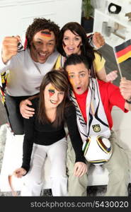 A group of friends supporting the German football team