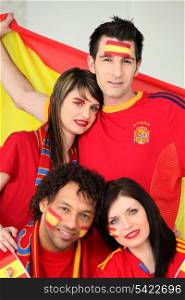 A group of friends supporting the Spanish football team