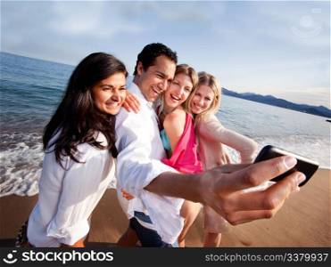 A group of friends taking a self portrait with a camera phone